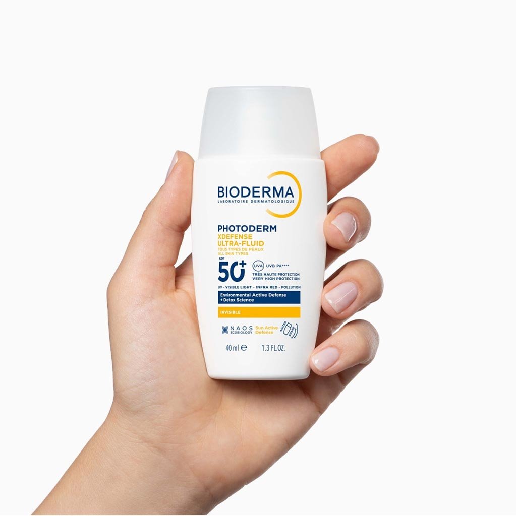 efb923a23af863943f40624aaed34f92-packshot_photoderm_20xdefense_20invisible_20spf50_2028599 Bioderma Photoderm XDEFENSE ULTRA-FLUID SPF50+ INVISIBLE Tous types de peau – Image 1
